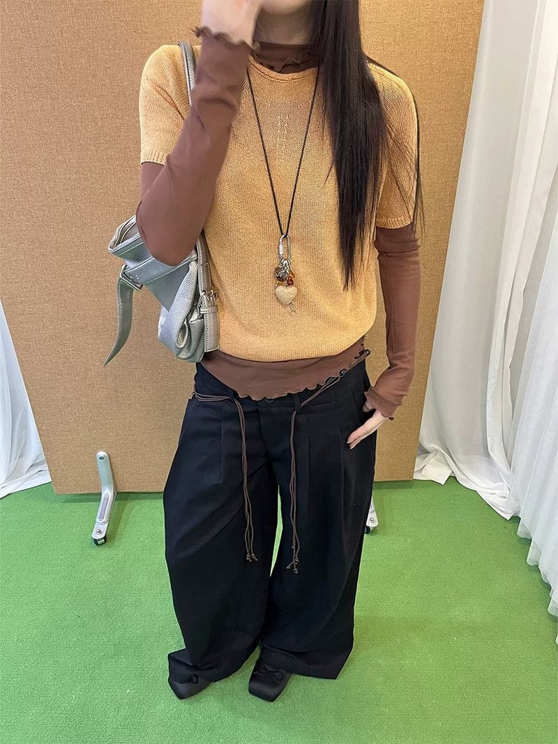 Black high-button-up wide pants