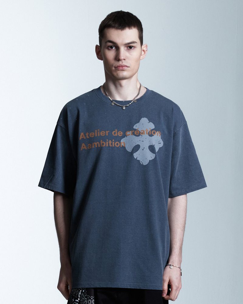 AAMBITION（アアンビション）の「Atelier Cross T-shirt (Vintage-Blue)（Tops）」