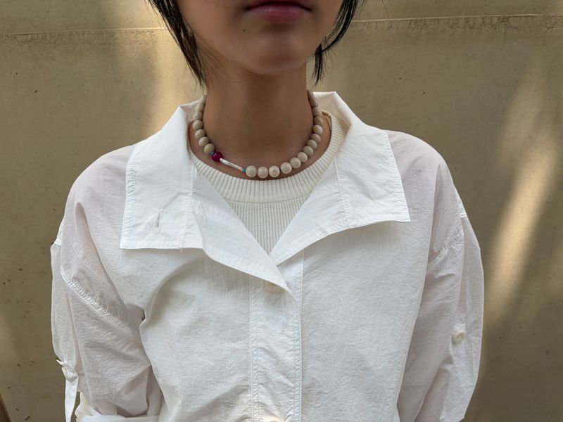 ERR（イアルアル）の「red pearl necklace（Accessories）」