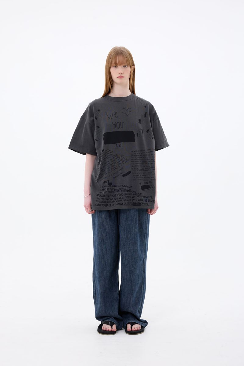 ARIKIM（アリキム）の「SCRIBBLE T-SHIRT / CHARCOAL（Tops）」