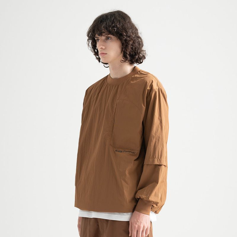 KALAPATTHAR（カラパタール）の「Nylon Zip Pocket Round Shirt - CAMEL（Tops）」