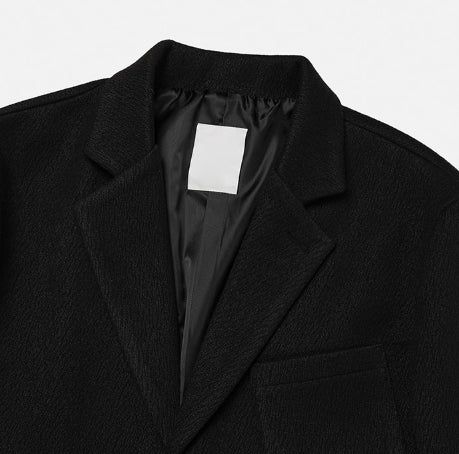 Crying medal over blazer