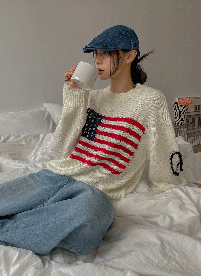 ULAN（ユレン）の「マンハッタン星条旗オーバーフィットニット（Tops）」