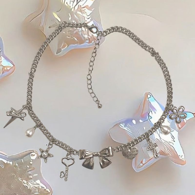 chouchou（シュシュ）の「 ribbon iib necklace（Accessories）」