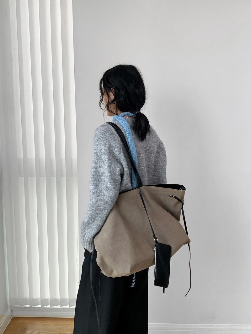Modi bow wool long-sleeved knitwear