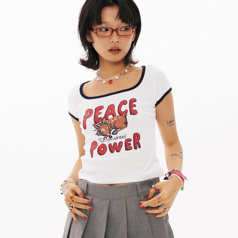 wonder visitor（ワンダービジター）の「PEACE Crop T-shirt [2Color]（Tops）」