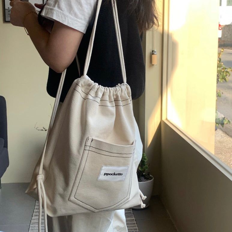 ppocketto ivory string bag