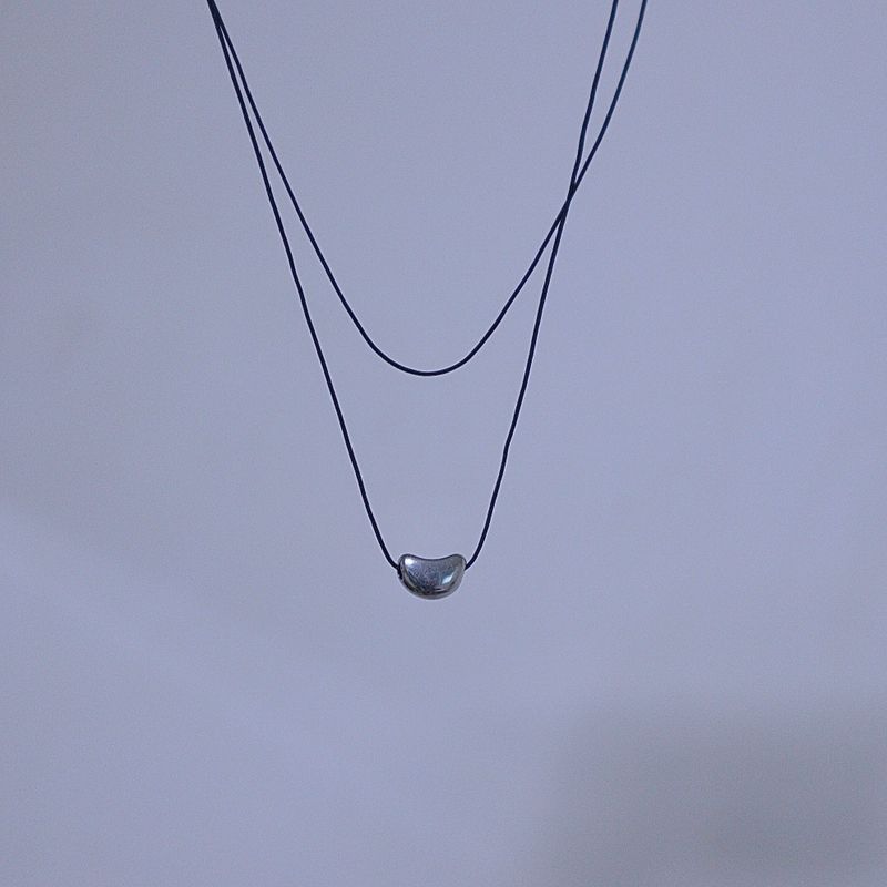layered string necklace