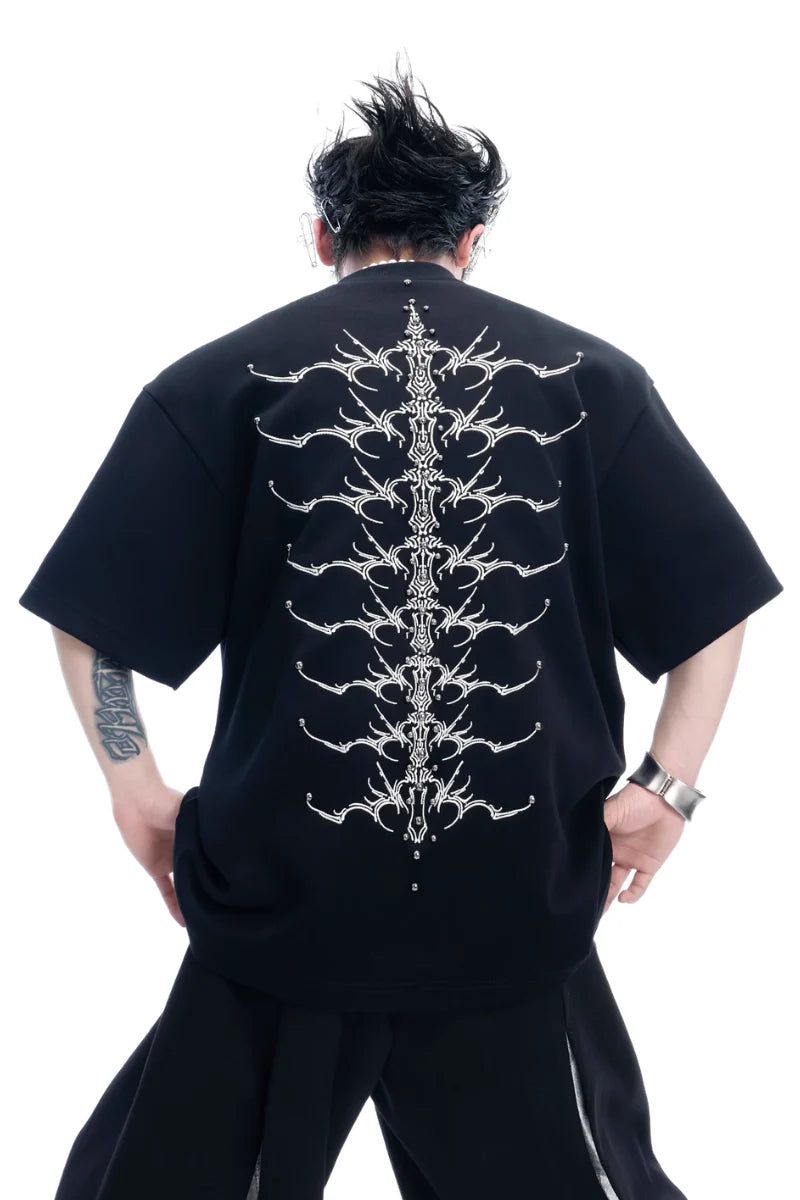 Argue Cultureの「スタッディドエンブロイダードスパインコットンTシャツ（トップス）」