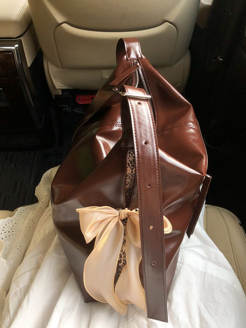 ovuni（オーブニ）の「Pillow ribbon bag_chocolate brown（Bags）」