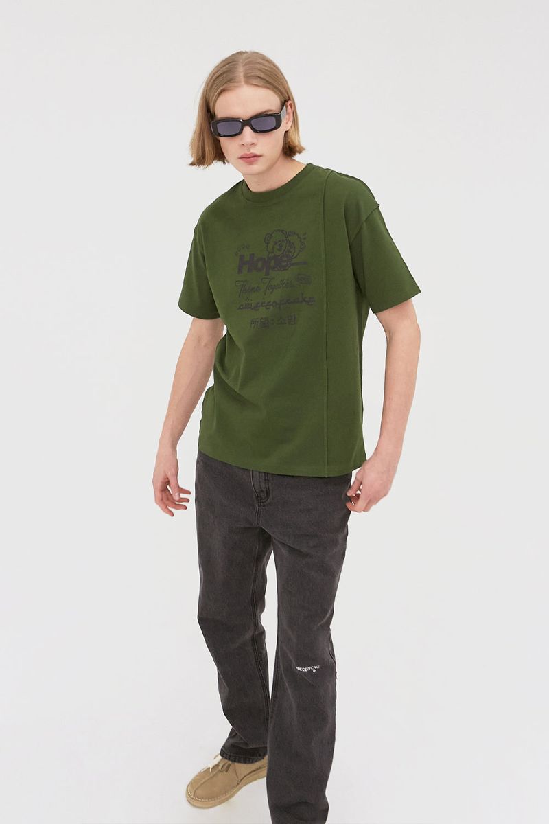 APIECEOFCAKE（ピースオブケイク）の「Hope Language Tee_Green（Tops）」