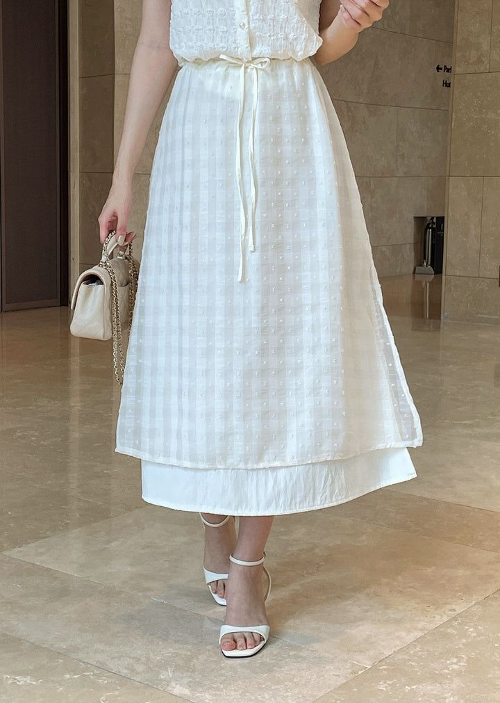 iam mari（アイアム マリ）の「Digen Check Dot String Layered Long Skirt（Skirts）」