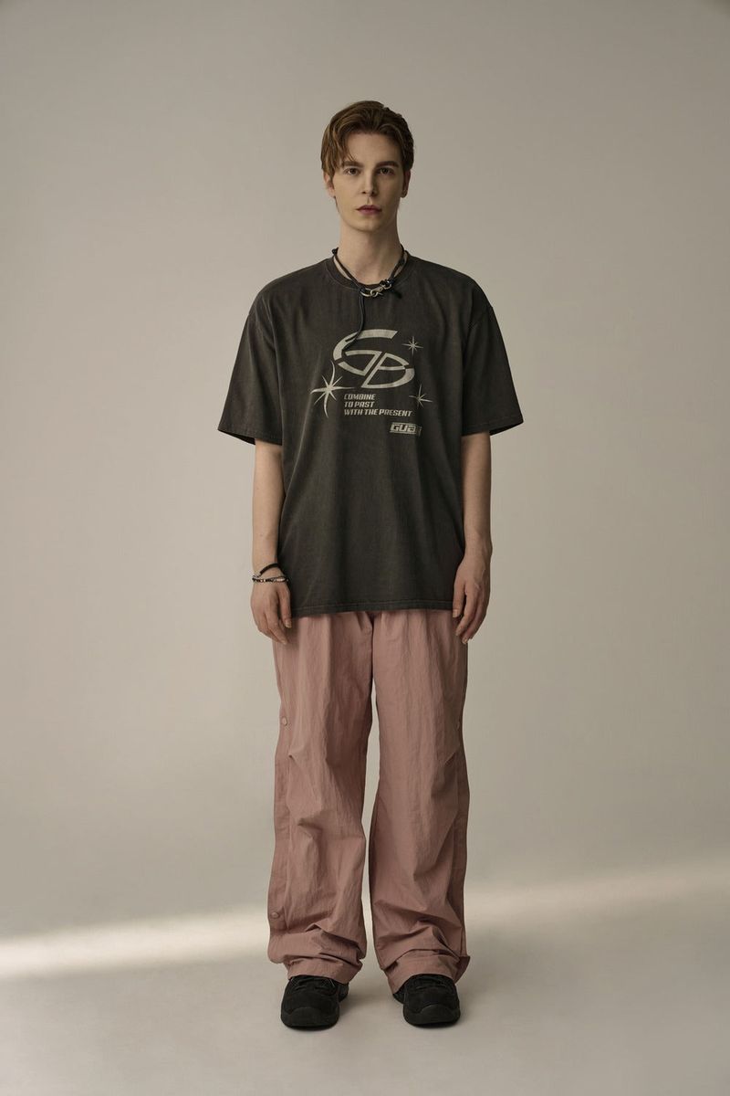 GUBIN(グビン)の「LINE COVER PARACHUTE PANTS (PINK)(Pants)」