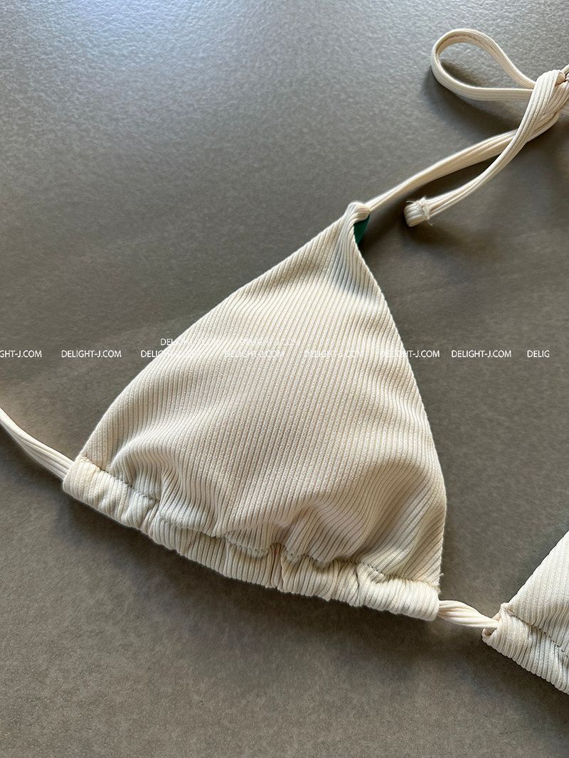 a set of 2 layered colored bikinis