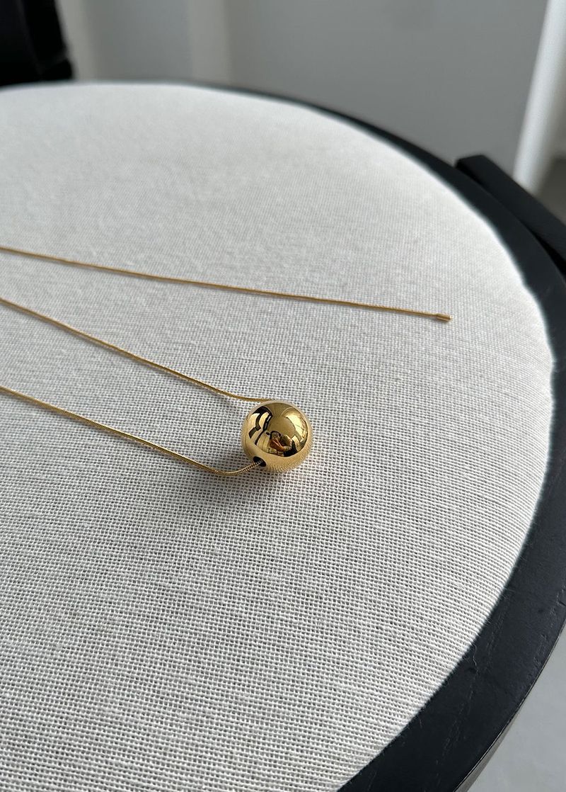maxy moving ball necklace - gold