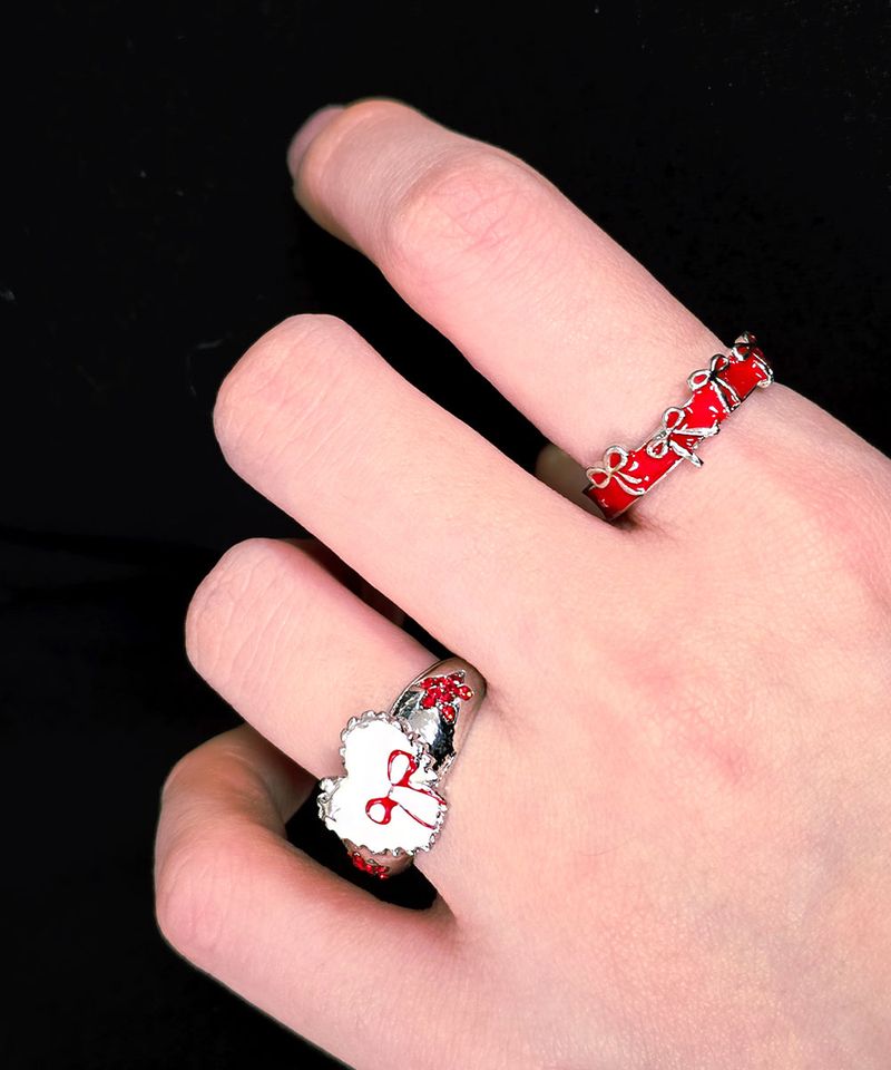 red ribbon ring