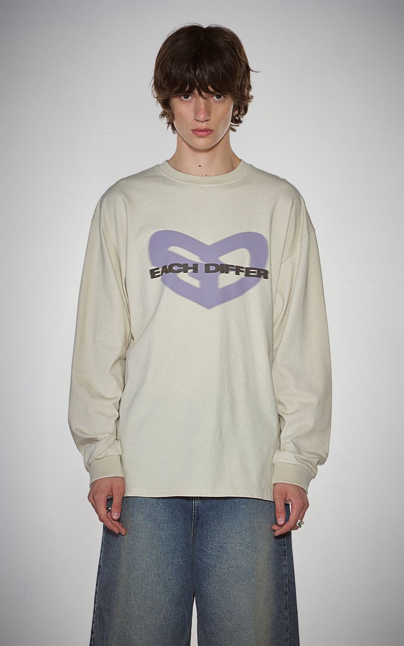 EACH DIFFER(イーチディファー)の「BLUR HEART LONG SLEEVE_BEIGE(Tops)」