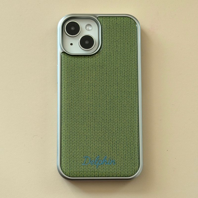 DELPHIN(デルフィン)の「EMBROIDERY KNIT EPOXY CASE_OLIVE(Smartphone Accessories)」