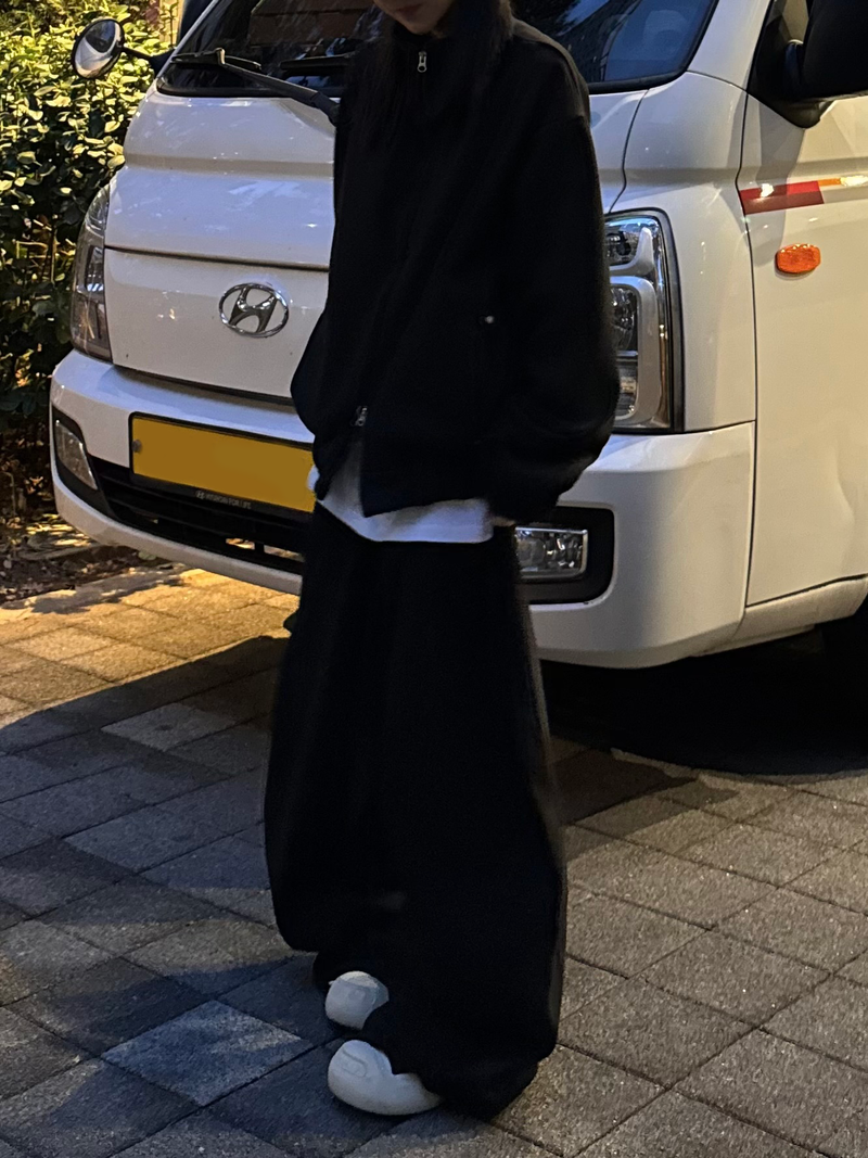 curved high-neck blouson zip-up