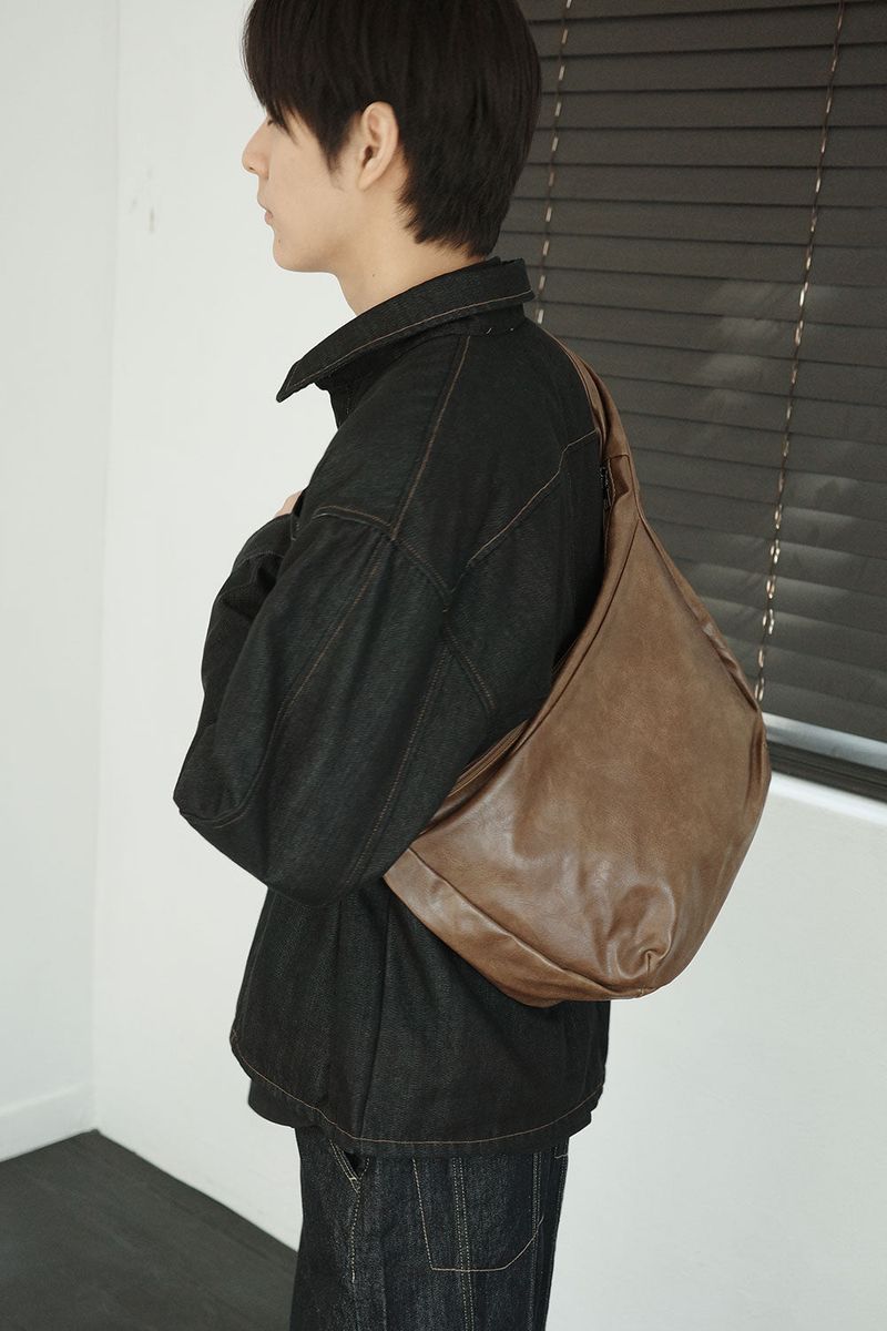 DOJINOI（ドジノイ）の「round hobo bag（Bags）」