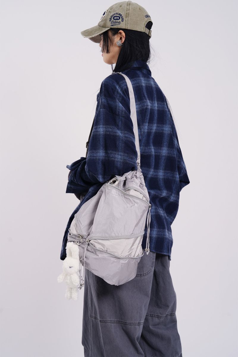 Raucohouse（ラウコハウス）の「Winding zip up drawstring cross bag（Bags）」