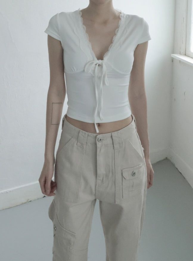 mnem（ムネム）の「Clia Lace V-neck Tee（Tops）」