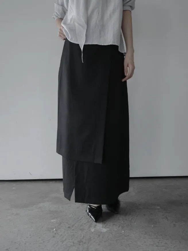 mnem（ムネム）の「Siu Slit Layered Long Skirt（Skirts）」