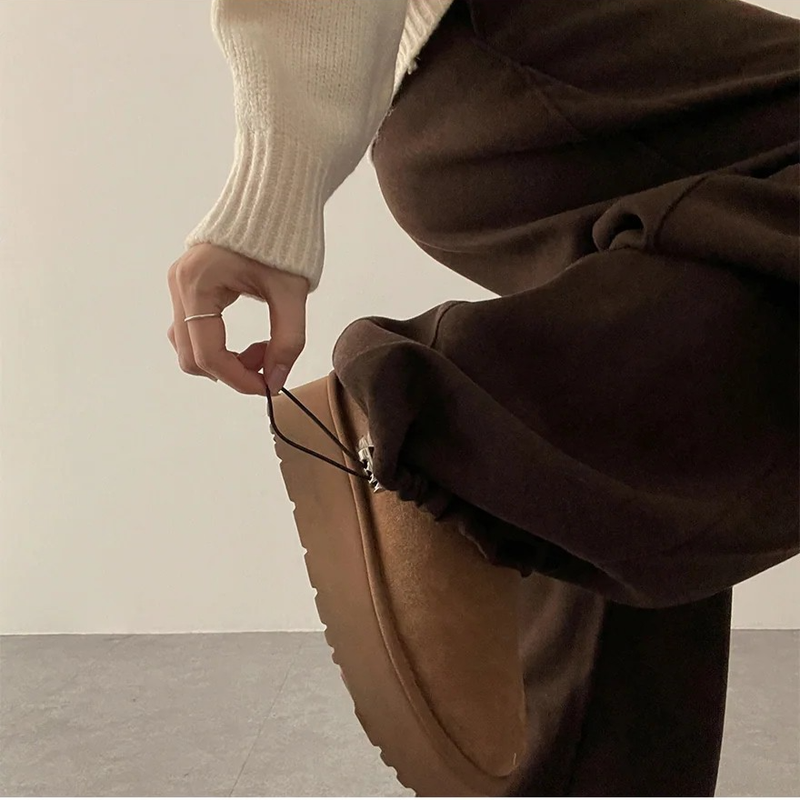 Mende Curved Incision Woolen Wide Pants