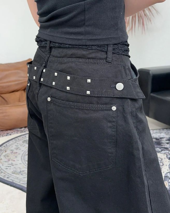 Pale studded strap pants