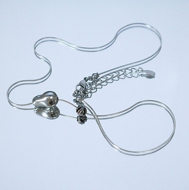 All surgical steel object cross necklace