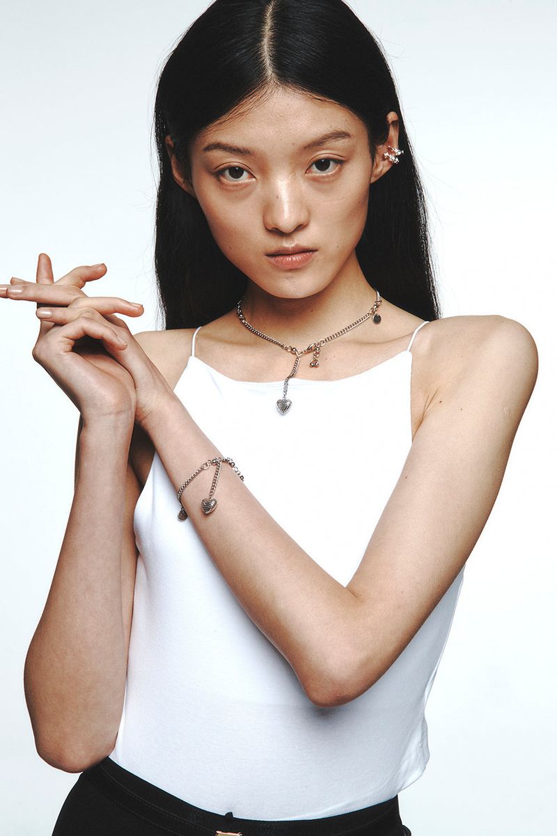 HEART PIERCING NECKLACE