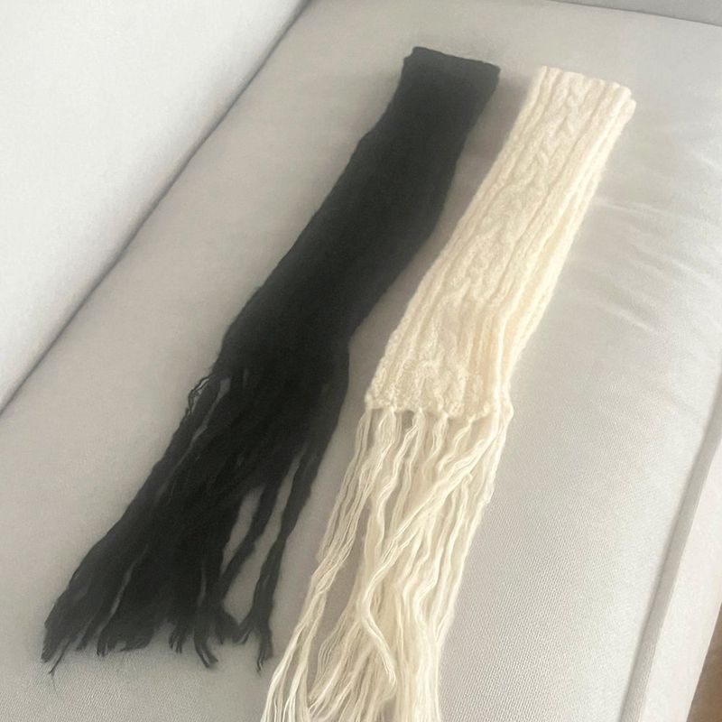 Seur Twisted muffler knit scarf