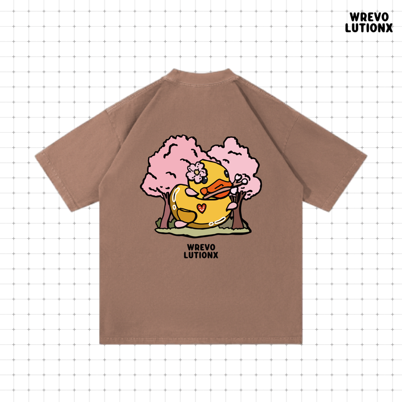 WREVOLUTIONX by WooLeeX（レボリューションエックス バイ ウーリーエックス）の「Sakura Duckling Denim-Washed Heavy‑Weight T-Shirt (Dusty Rose)（Tops）」