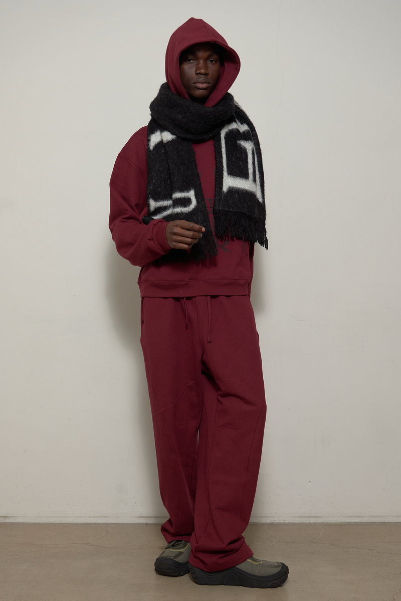 ER(EEERRR)（イーアール）の「Side surfboard sweat pants (Burgundy)（Pants）」