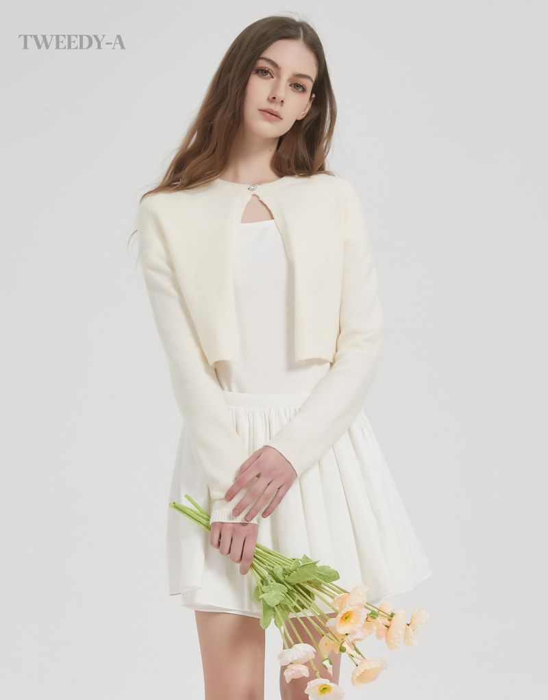 TWEEDY-A（ツウィーディア）の「Catherine Hart one-button knit cardigan ivory（Tops）」
