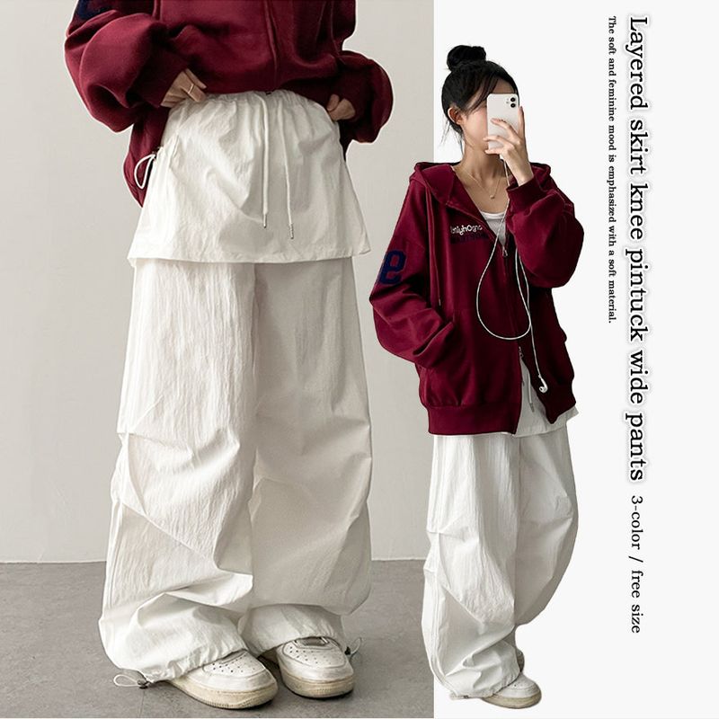 Log banding layered pocket skirt pants