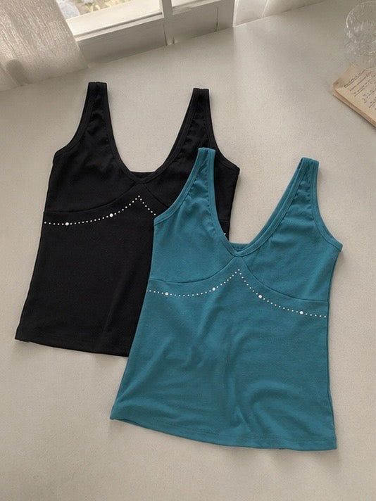 onthenextpage（オンザネクストページ）の「Glow Stud Sleeveless（Tops）」