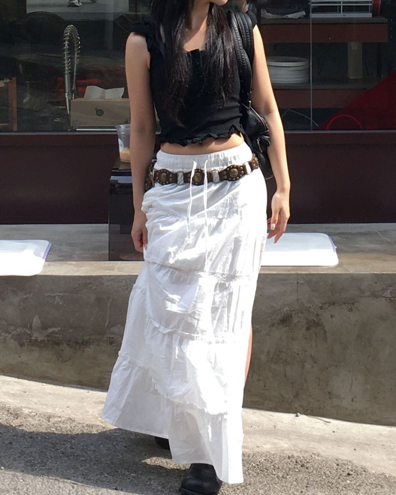 Cutting white long skirt