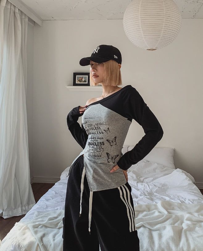 ULAN（ユレン）の「Butterful Lettering Unbalanced Off-Shoulder Long Sleeve（Tops）」