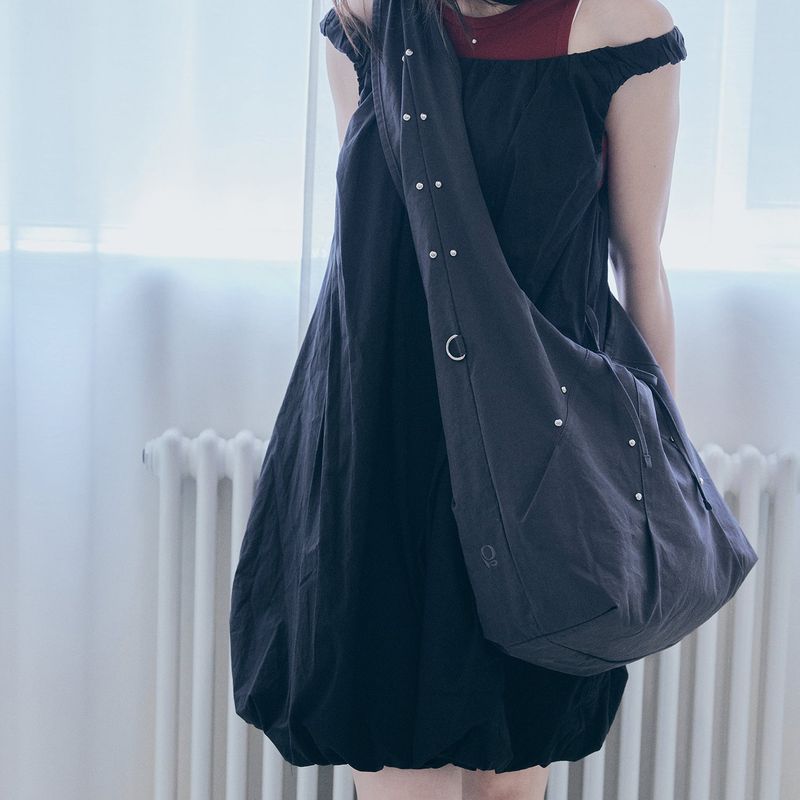 poie（ポイエ）の「rivet cross bag (charcoal)（Bags）」