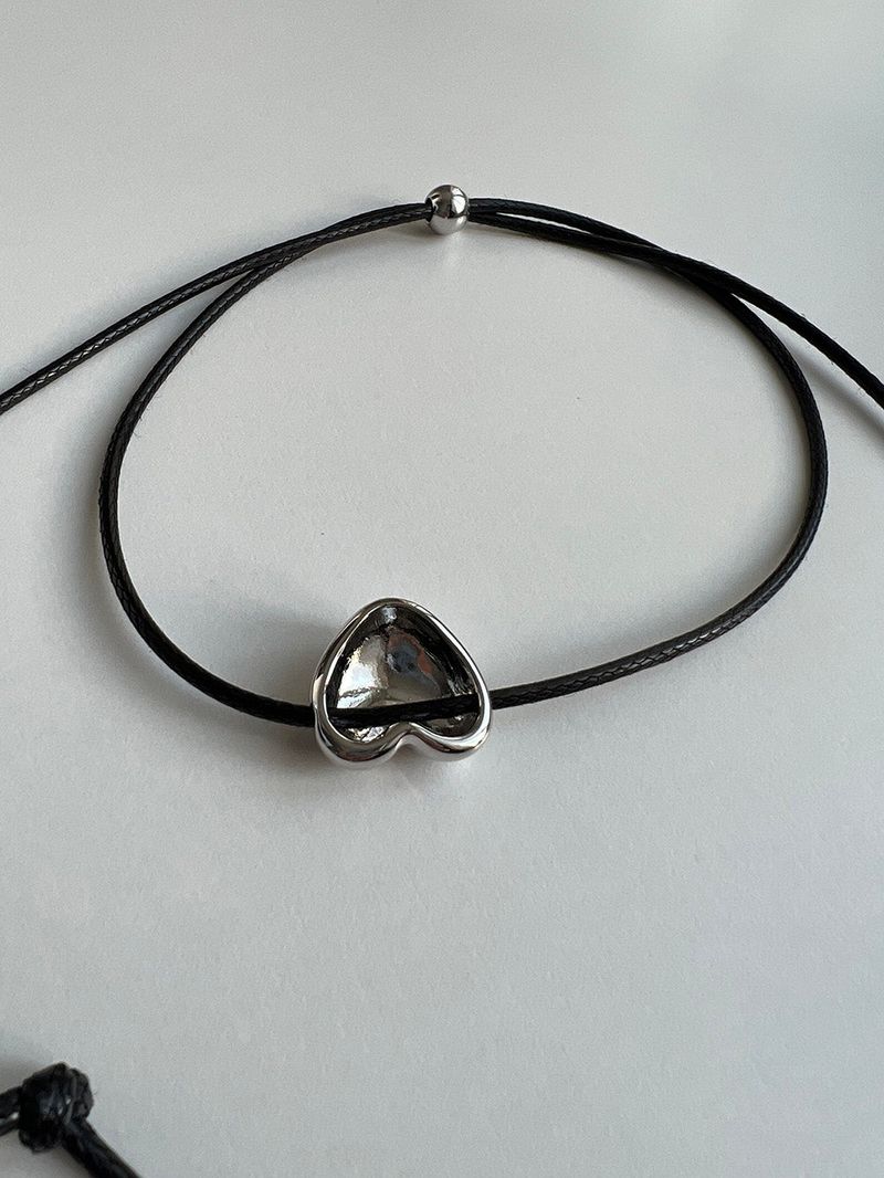 String heart necklace