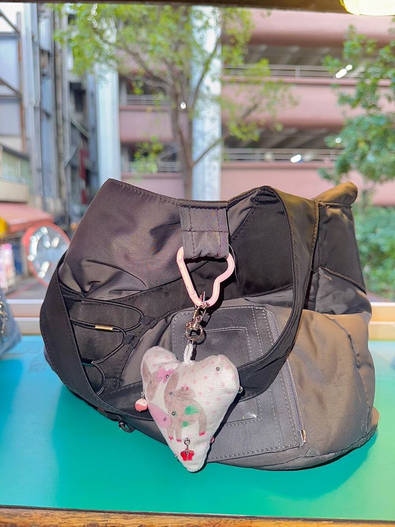 Pierced pinky cow keychain