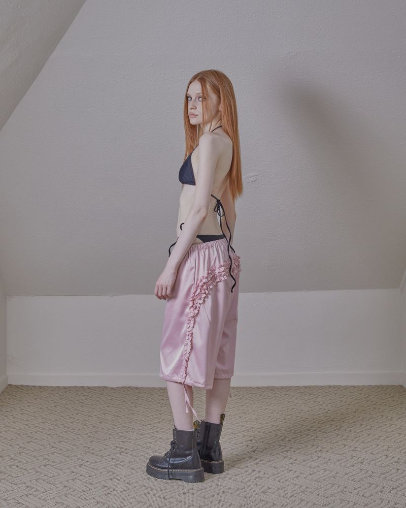 satin ruffle track pants / pink