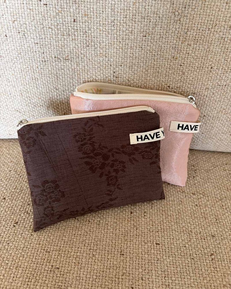 HAVE YOU EVER（ハヴユーエバー）の「Linen floral flat pouch - brown , M size（Accessories）」