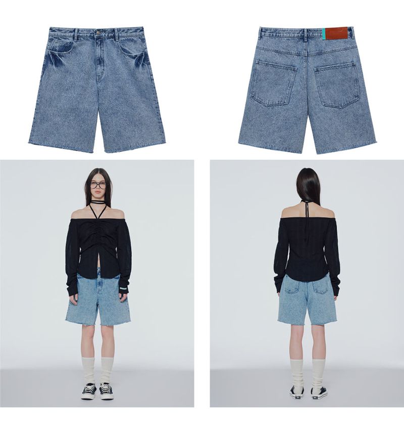 Destroyed denim bermuda shorts