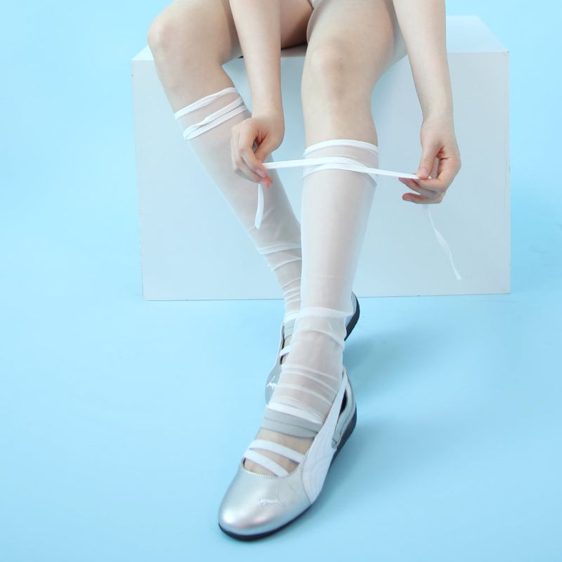 onnitella（オニテラ）の「sheer strap leg warmer (white)（Fashion Accessories）」