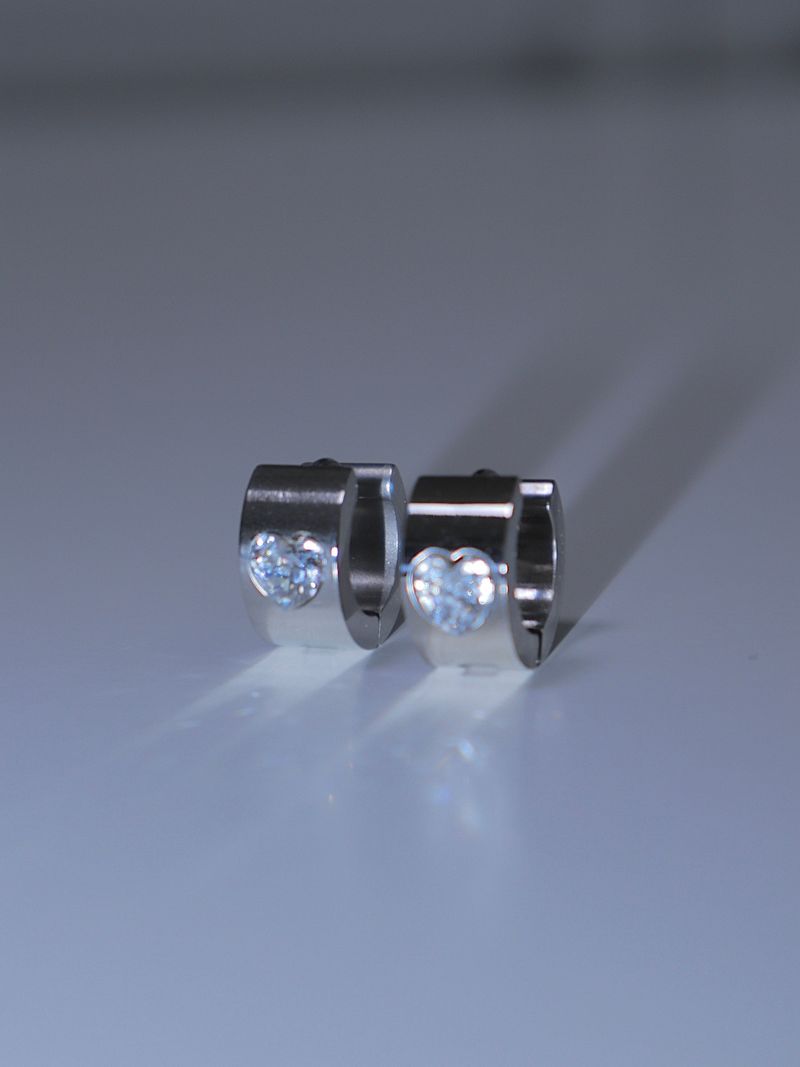 RUNARING（ルナリング）の「All surgical steel bold heart cubic ring earrings（Accessories）」