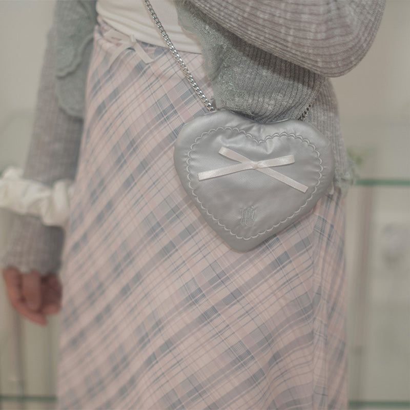 mieo(ミエオ)の「Ribbon Heart Bag _ Sliver(Bags)」