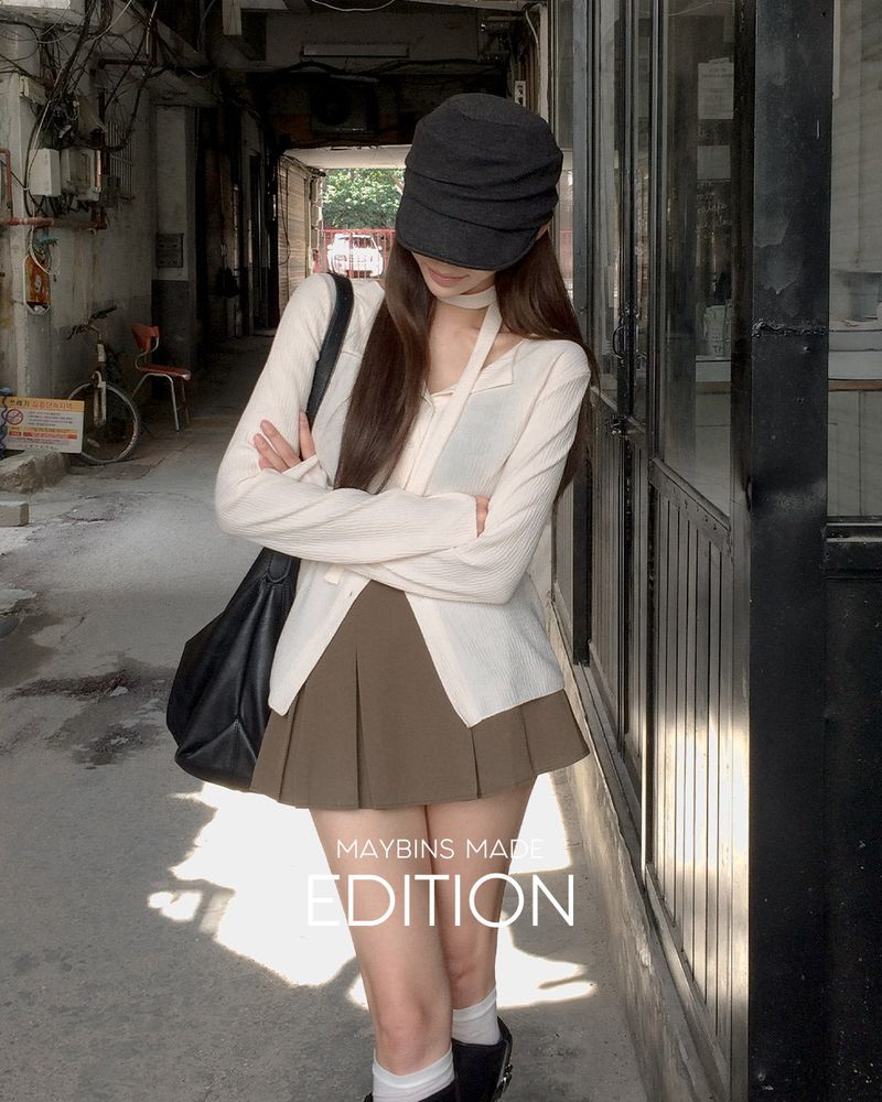 MADE. Rua pleated mini skirt with built-in shorts