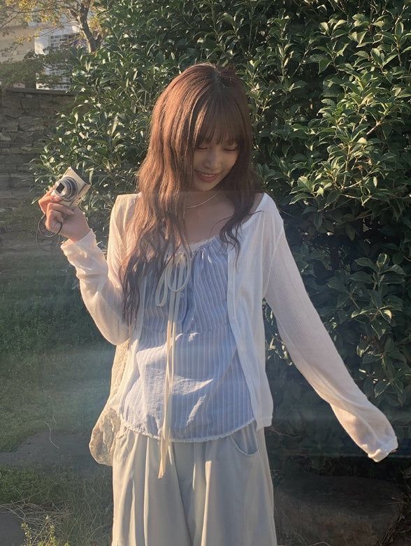 anyonemore（エニーワンモアー）の「Tessie See-through Ribbed Round Cardigan（Tops）」